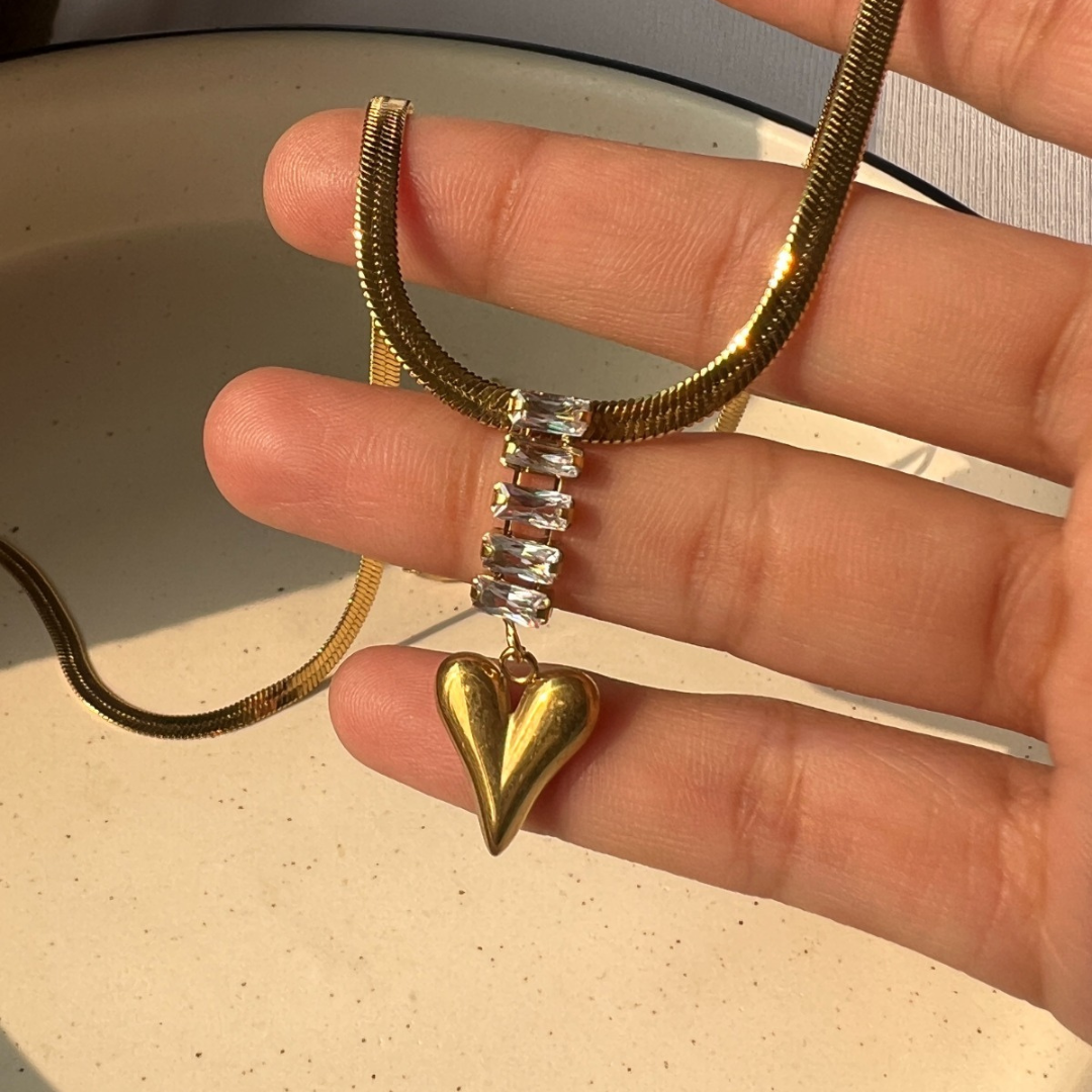 Supreme gold heart sale and arrow pendant